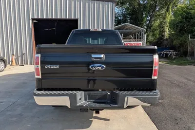 Black Ford F-150 finished inside and out, gloss black paint