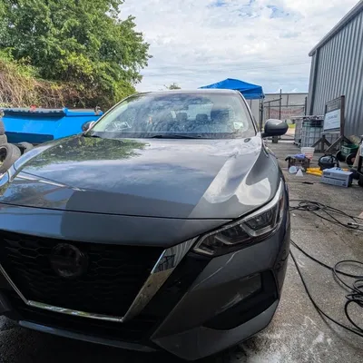 Foam bath during a hand wash on a Nissan Sentra